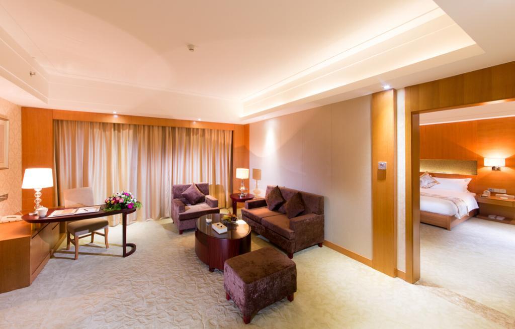 The Grand Plaza Hotel Цзиань Номер фото